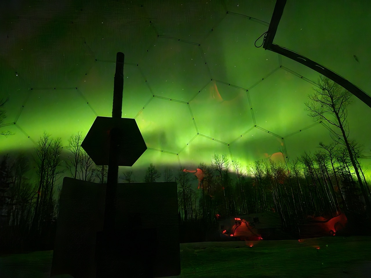 Northern lights seen from the clear bedroom dome
