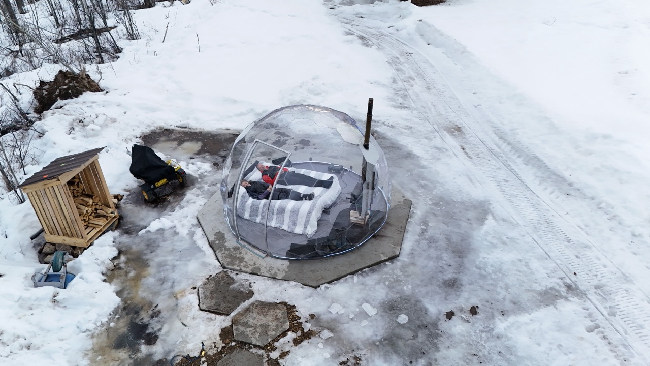 Outdoor bedroom dome in the snow